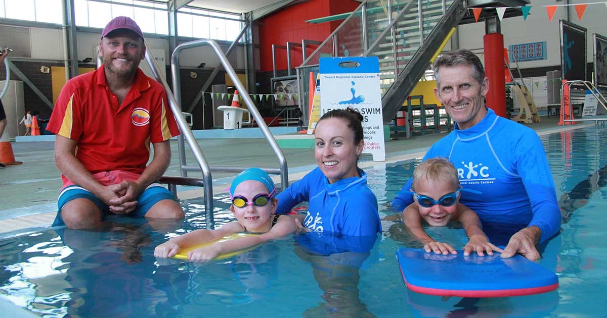 Children and teachers at Learn to Swim class